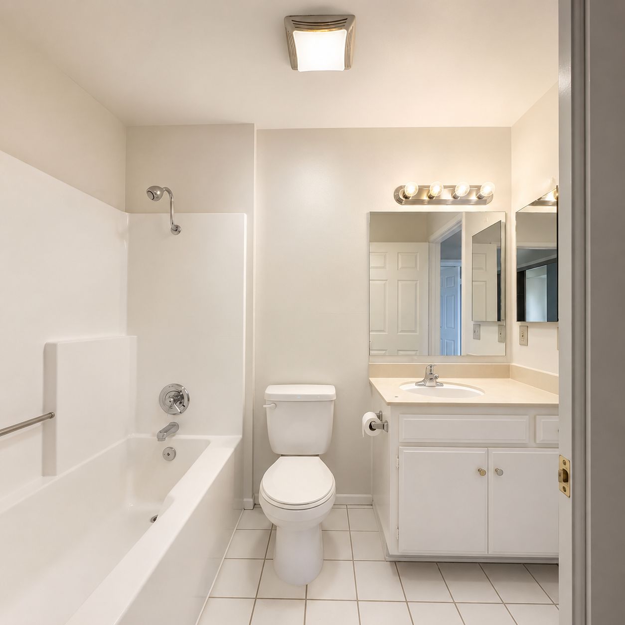 Full bathroom with tub and vanity