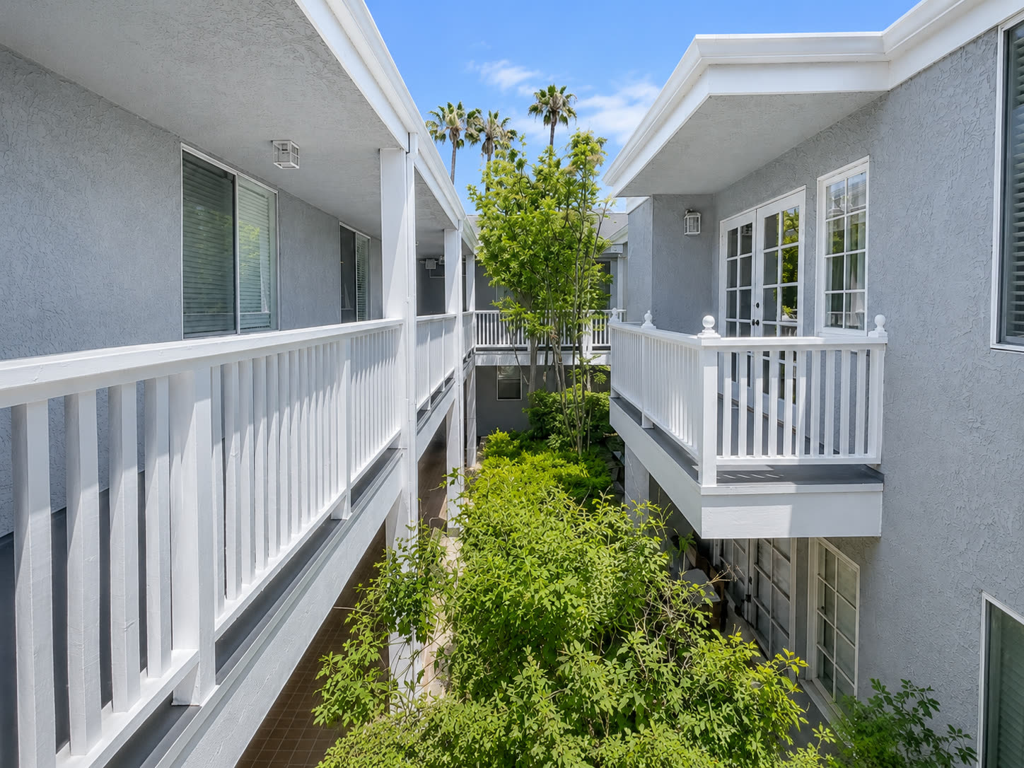 Interior courtyard with balconies and greenery